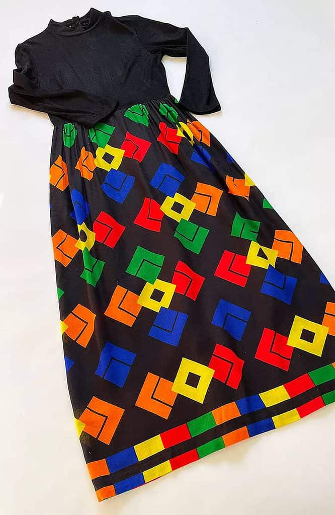 Hostess dress with bold geometric patterned skirt