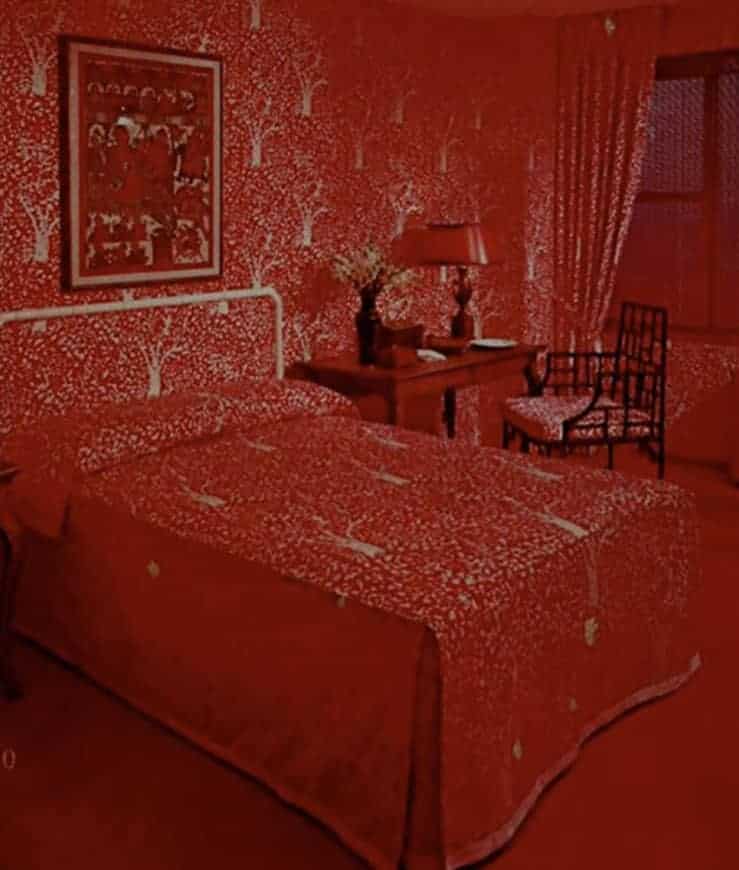 70s bedroom decorated entirely in red and gold