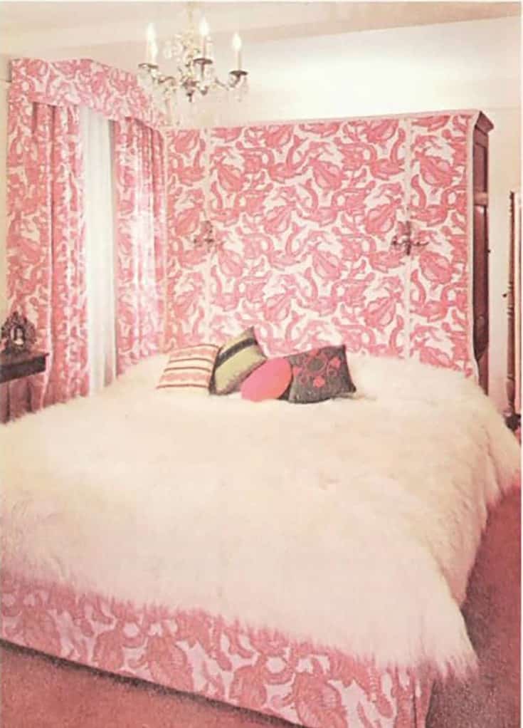 70s bedroom with pink wallpaper and fur bedspread